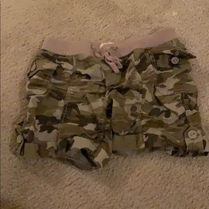 Camo, butt-pop shorts.